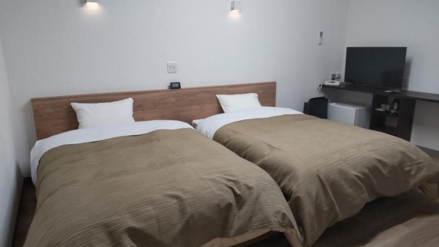 Basic Hotel Титибу Экстерьер фото